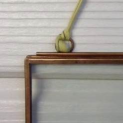 Nkuku Petit cadre paysage kiko en laiton